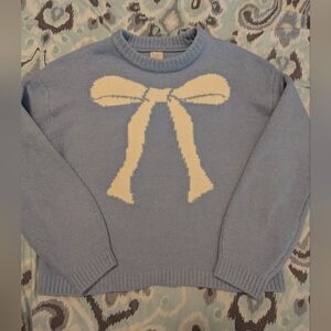 Women's Blue Sweater with Cream Bow Design